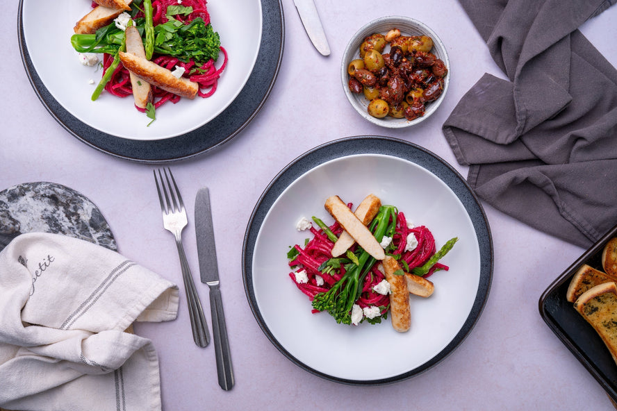 Beetroot Pasta with Feta and HECK! Simply Chicken Chipolatas