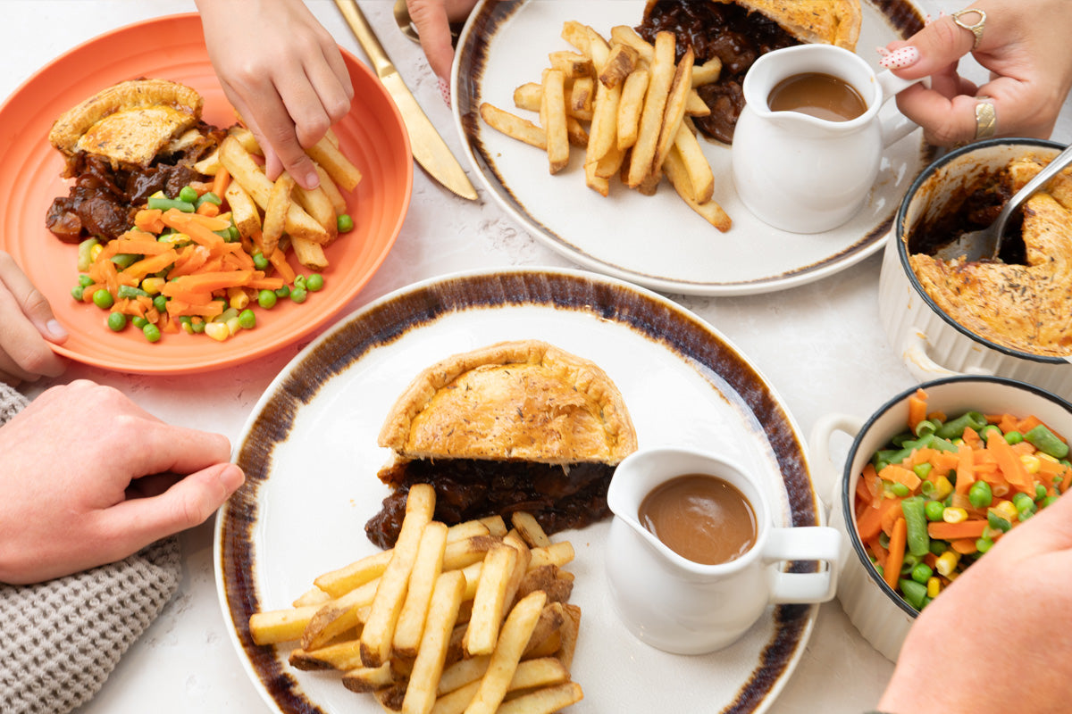 HECK! Steak & Butter Pie with golden puff pastry and rich sausage filling