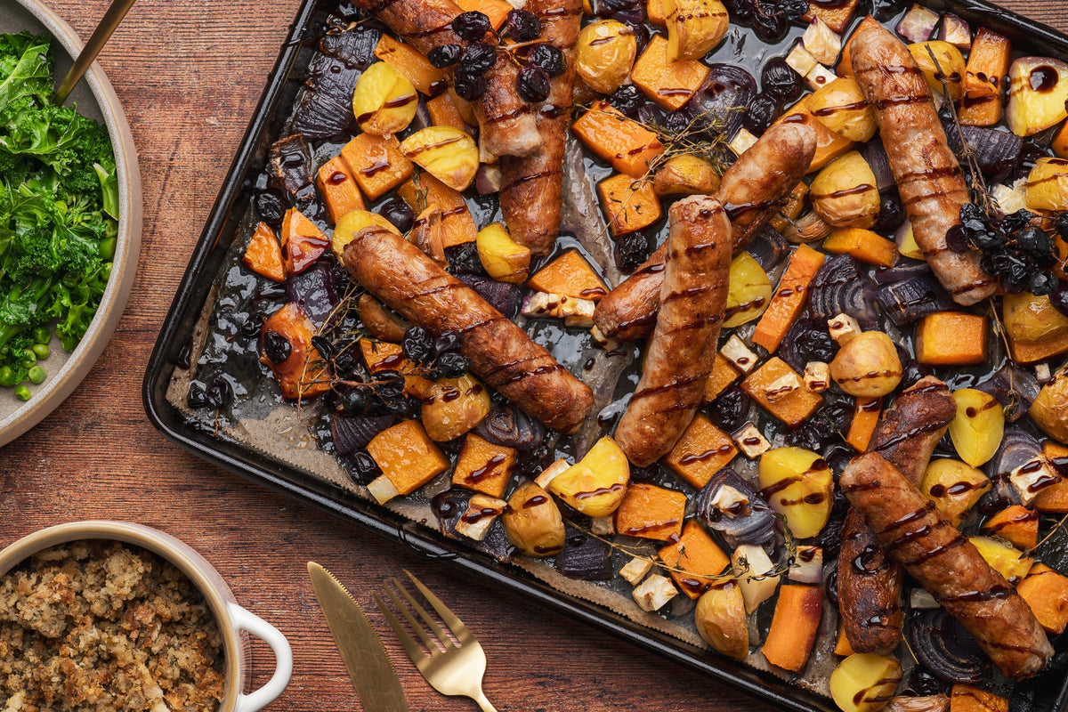 Pork sausage, roasted grapes and butternut squash traybake