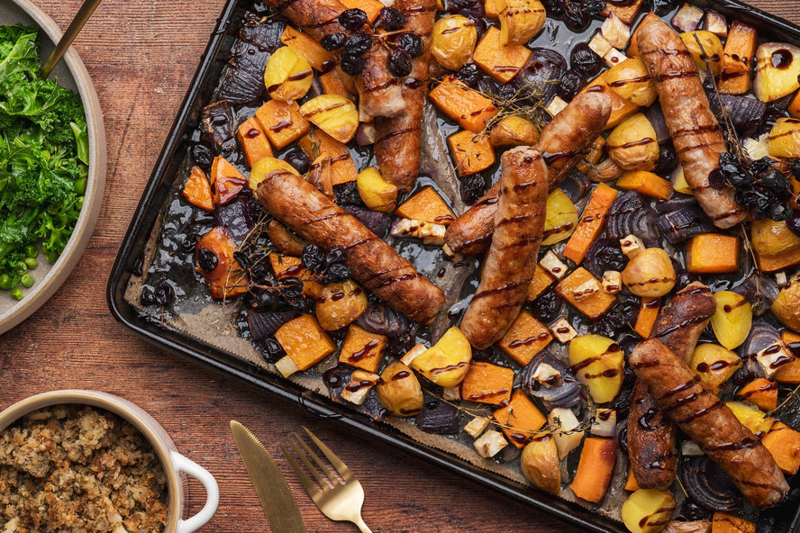 Pork sausage, roasted grapes and butternut squash traybake