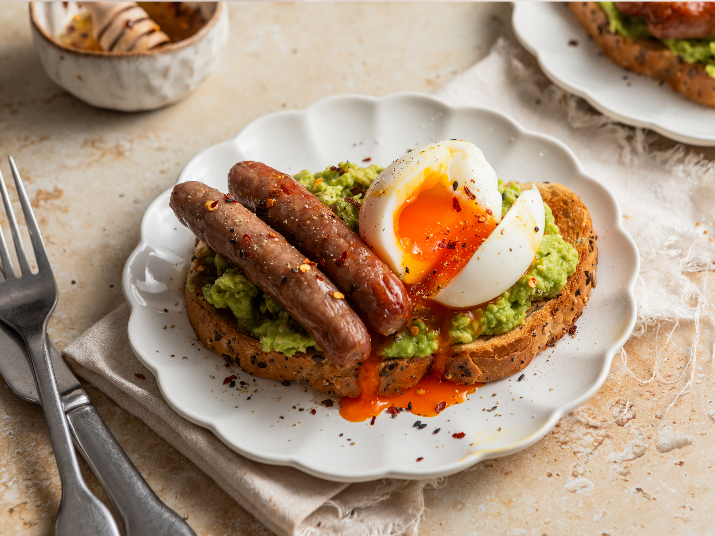 Hot honey sausage & avo toast