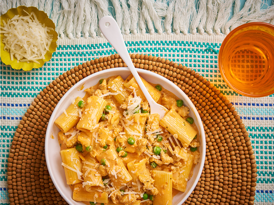 Creamy Sausage Ragù Pasta with Peas & Parmesan