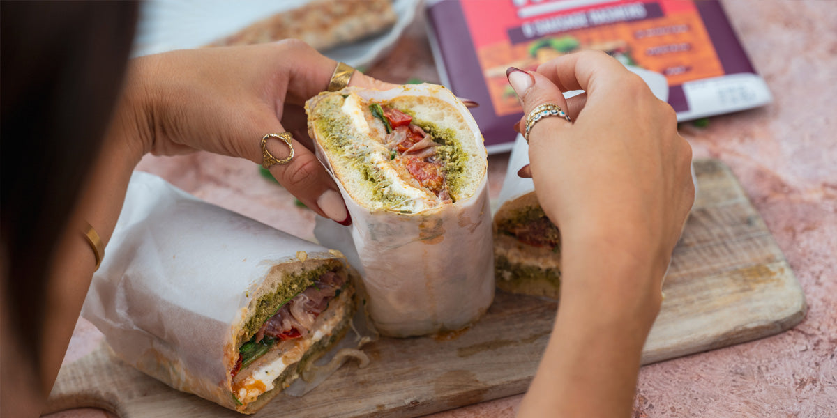HECK! Italia Sandwich with rashers, burrata, Parma ham, and pesto in ciabatta