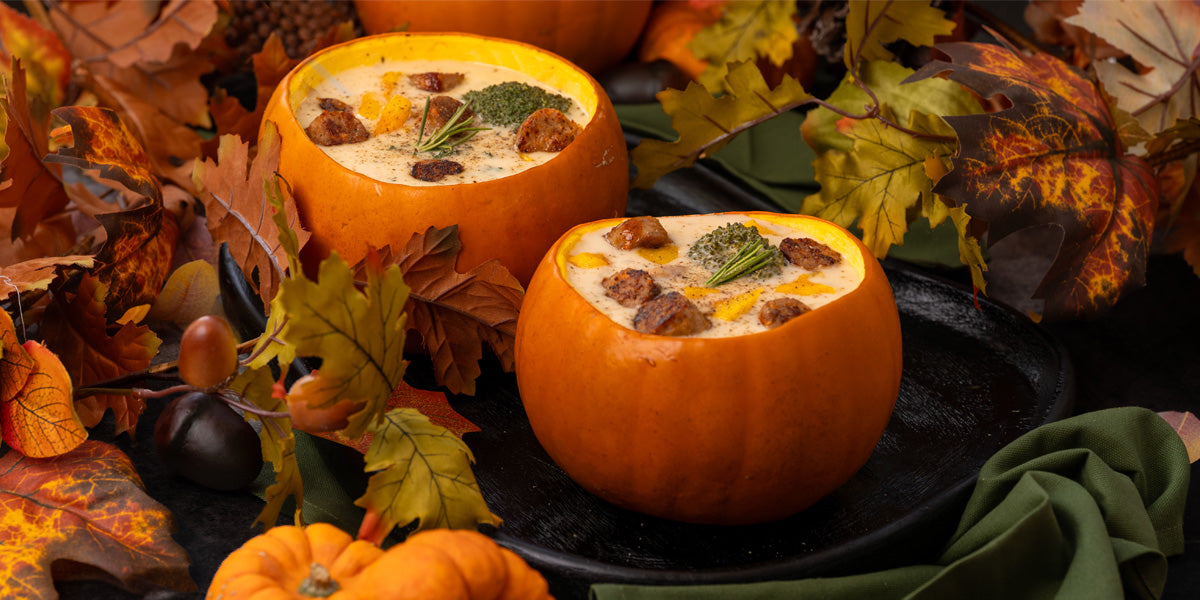 Creamy broccoli and pumpkin soup with HECK! Pumpkin Spice Sausages served in a bowl